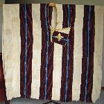 Traditional gown (boubou) made with country cloth and embroidered, Liberia