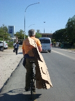 Carrying pack boxes to the airport, Maun, Botswana