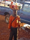 Mbouda: marginal employment - boy selling sundries