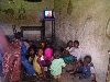 Kumba-Buea road: children in front of television