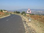 Steep climb sign mis-aligned to show a steep descent.