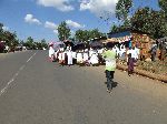 Stream of people along the highway, Dembecha, Ethopia