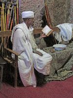 Priest, Bet Golgotha (rock hewn church), Lalibela, Ethiopia