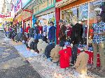 Men's clothing stores, displaying there wares with rows of manikins