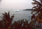 Ghana, Dixcove, fishing boat returning to the village