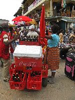 Accra, Ghana: Makola Market - drink seller