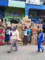 Accra, Ghana: Makola Market - carrying merchandise