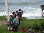 Ghana, team hauling in fishing net