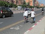 Girls bicycling, Marrakesh, Morocco