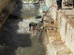 Cleaning hides in the river, Fez, Morocco