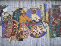 Lome, Togo, relief mural with bicycle