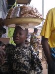 Bohicon, Benin, women head carrying products for sale