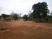 near Abomey, Benin, school yards with bicycles parked on the side.