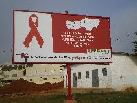 Comé, Benin, sign for HIV/AIDS awareness