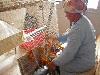 Woman weaving carpet, weaving coop, Ain Draham