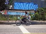 Woman and child doing errands by bicycle, Gapyeong