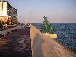 Boardwalk with public art, along the seawall in Jeju City, Jeju Island