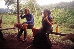 Ecuador, Pastaza, Otto village, snacking on sugar cane