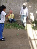 Children playing tops