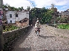 Ayora, cycling across stone bridge