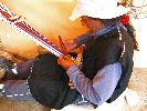 Ecuador, Salasaca: weaving a belt on a loom