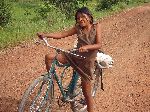 Young girls bicyclist, Rupununi, Guyana