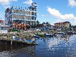 Charity on the banks of the Pomeroon River, Guyana