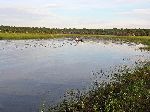 Doing errands by canoe, Wakapoa, Guyana