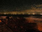 squid boats line the horizon at night