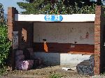 Livingroom chair repurposed to bus shelter, Korea