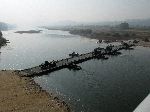 Army training constructing a temporary bridge across the Han River, Korea