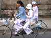 Veitnamese high school students on bicycles