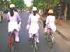 Veitnamese high school students on bicycles