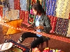 Woman weaving on traditional loom, My Son