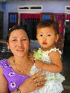 Lunch hostess and child, Krong