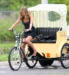 Jennifer Aniston bicycling