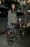 Joy Bryant bicycling