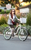 Miley Cyrus bicycling