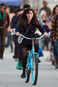Zooey Deschanel bicycling