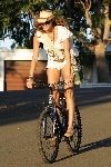 Elle MacPherson bicycling