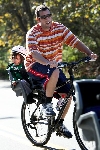 Adam Sandler bicycling