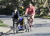 Liev Schreiber and Naomi Watts bicycling