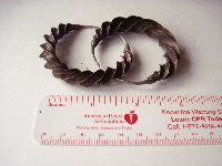 twisted silver Fulani earing (bhoyl�)