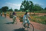 Women bicycling, Burkina Faso, West Africa