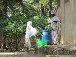 Priest and parishioner, Kuskuam Church, Gondar, Ethiopia