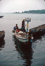 Ghana, Dixcove, fishing boat returning in the morning