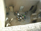 Sheep, goats and kitchen in courtyard of a house, Djenne