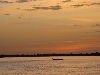 Canoe at sunrise on the Niger River, Mali