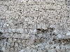 Old bricks and new bricks in the wall at Djenne Mosque, Mali