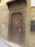 Door of Riad (Garden house) in the medina, Fez, Morocco